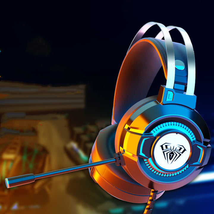 S602 gaming headset with RGB breathing lights and boom microphone, blue and black, angled view