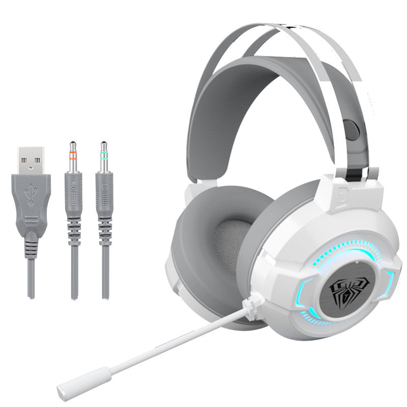 S602 gaming headset in white with USB and 3.5mm cables and over-ear boom mic design